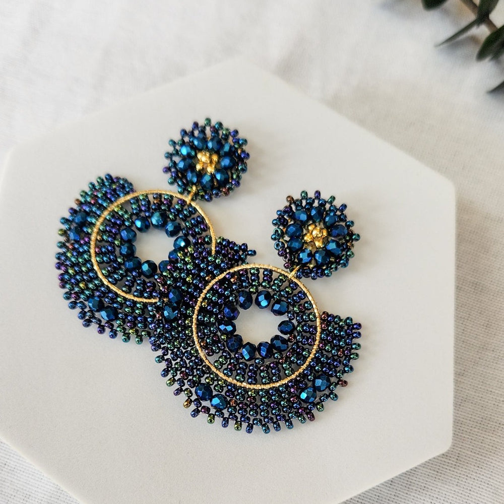 Deep blue indigo beaded earrings with gold details 