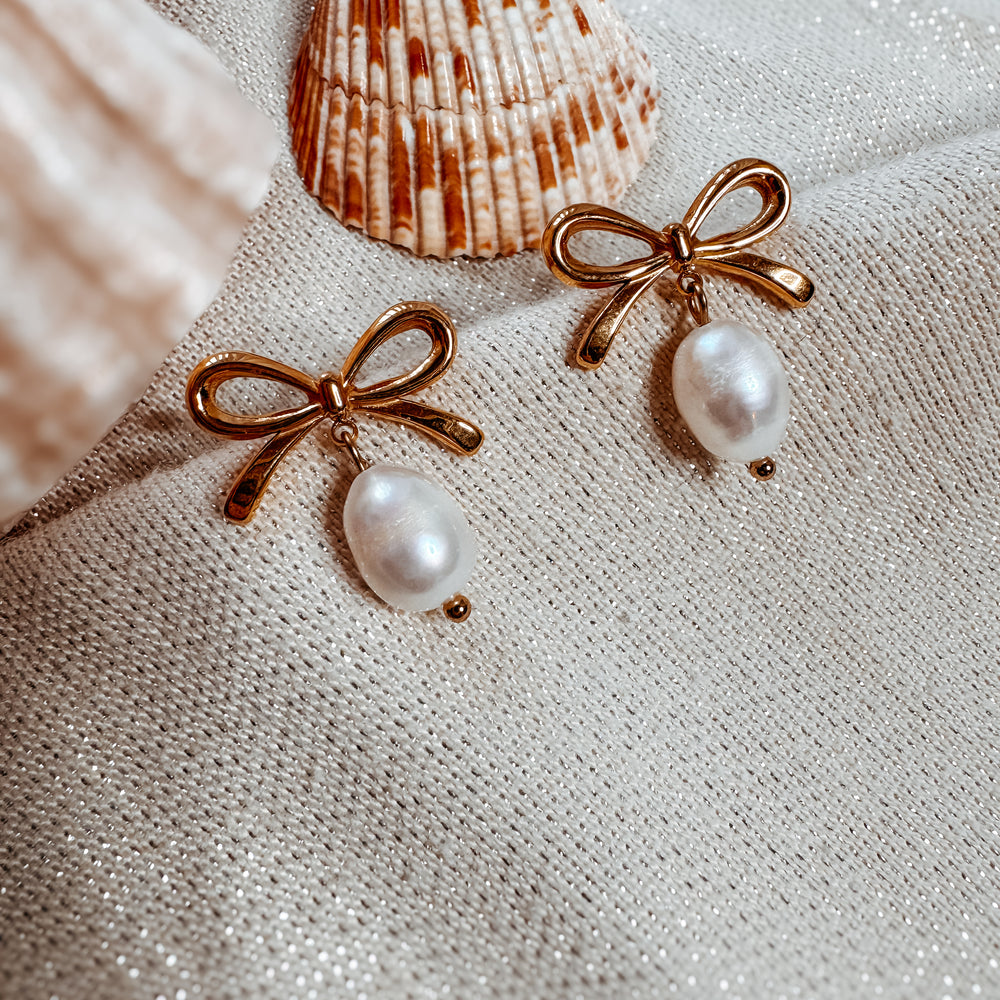 
                      
                        Kate Bow Pearl Stud Earrings
                      
                    