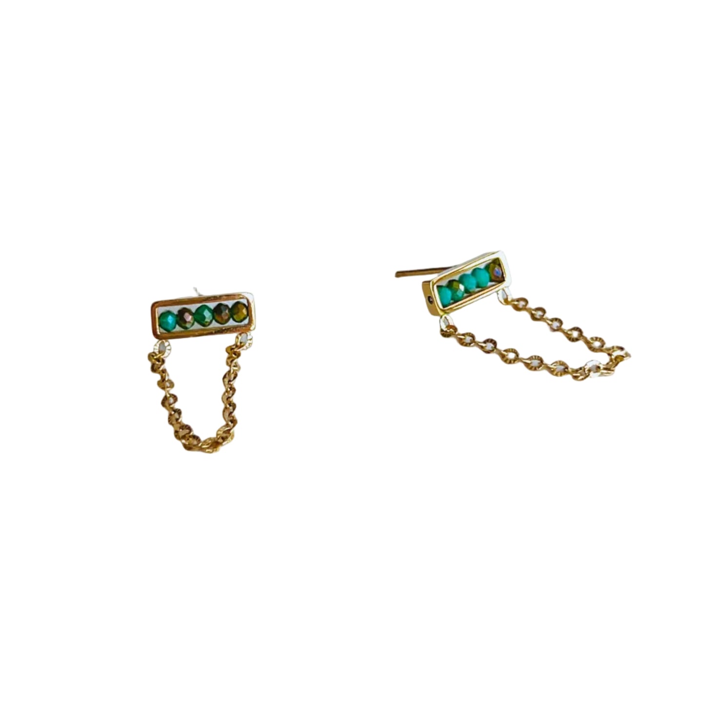 Abaco Chain Earrings - Aquamarine Gold earrings with green gemstones on a light background