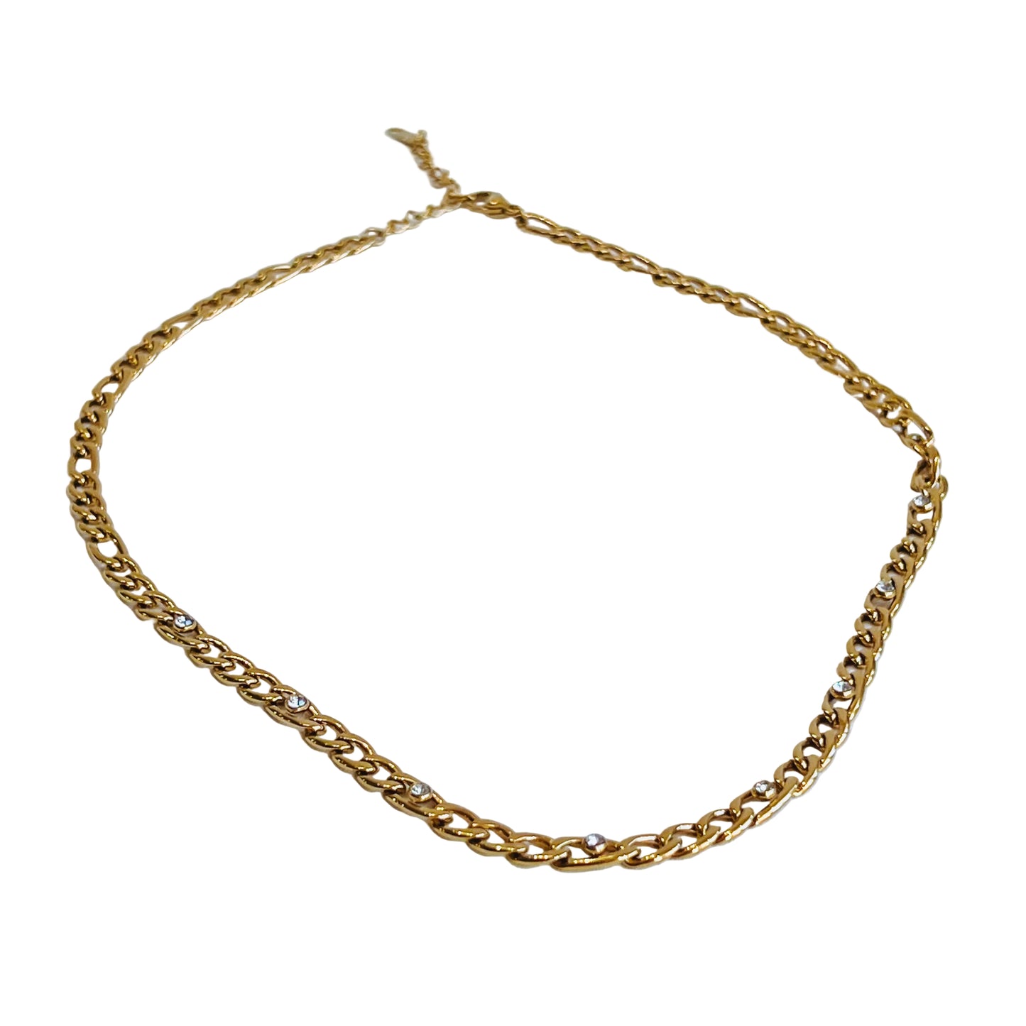 Gem Gold Chain Necklace Gold chain necklace encrusted with small diamonds on a light background