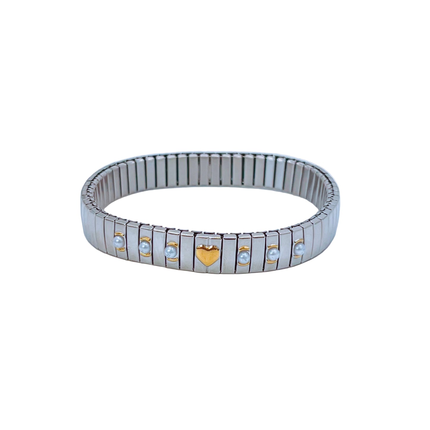 Heart Mixed Metal Elastic Braclet with gold heart charm and small stones on a light background