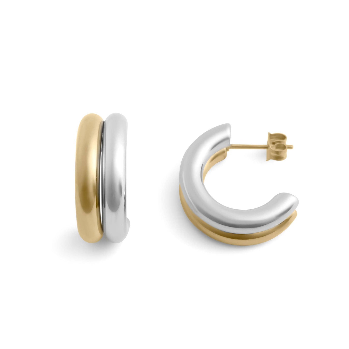 Mixed Metal Huggie Earrings Two gold and silver hoop earrings on a white background