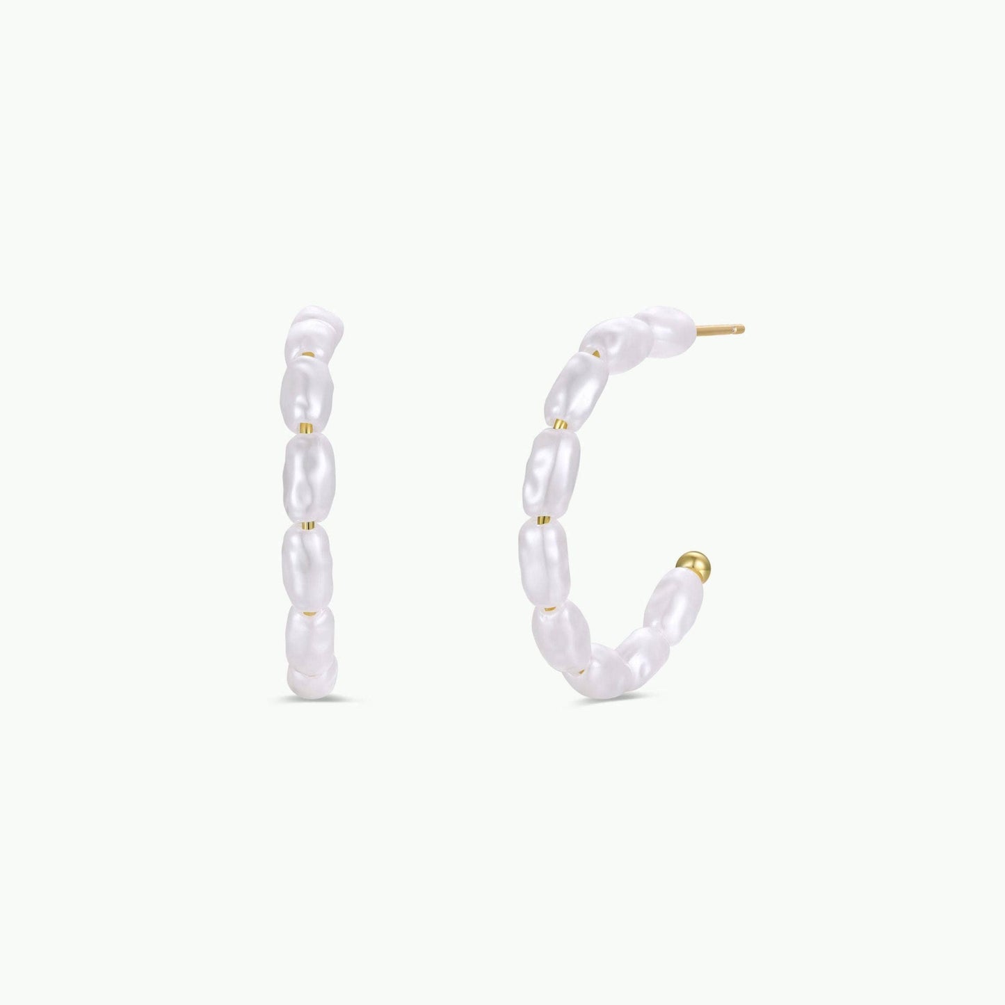 Multi Pearl Hoop Earrings Pearl hoop earrings on a white background