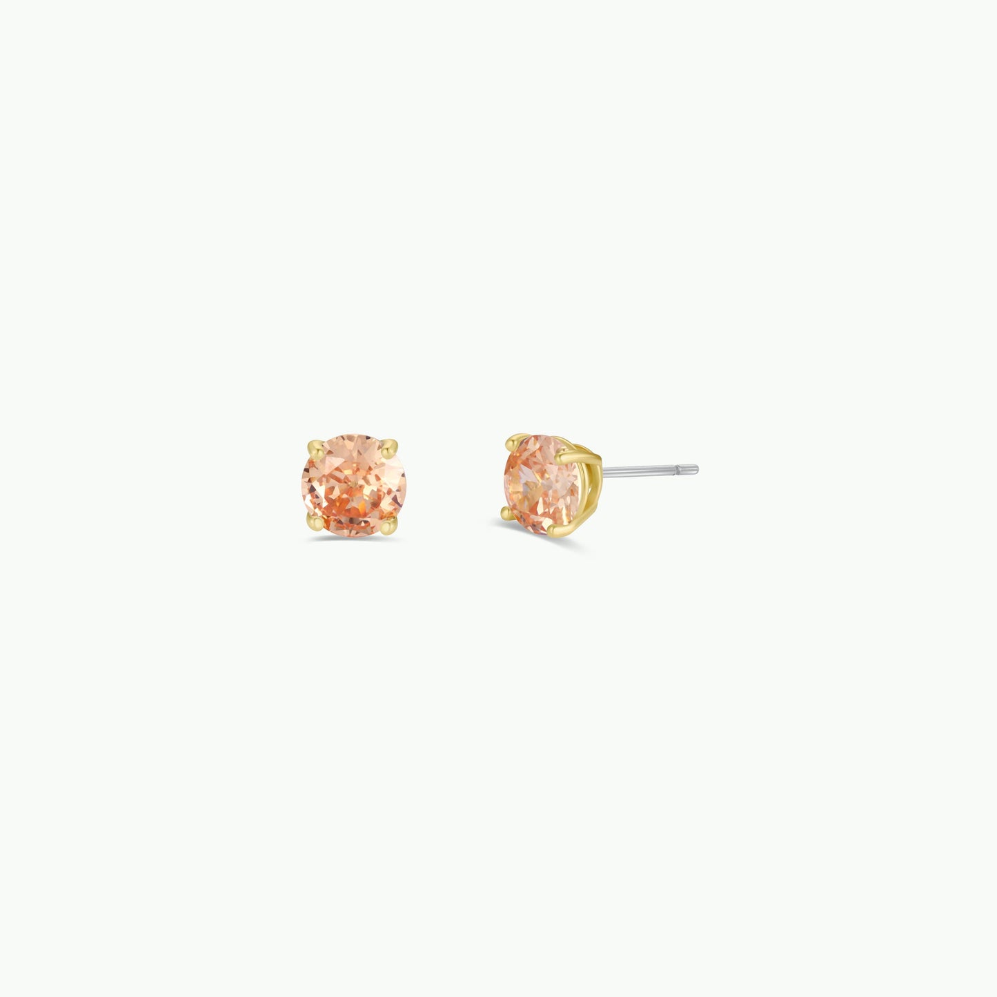 Round Gold Earrings - Champagne Pair of champagne peach-colored gemstone stud earrings