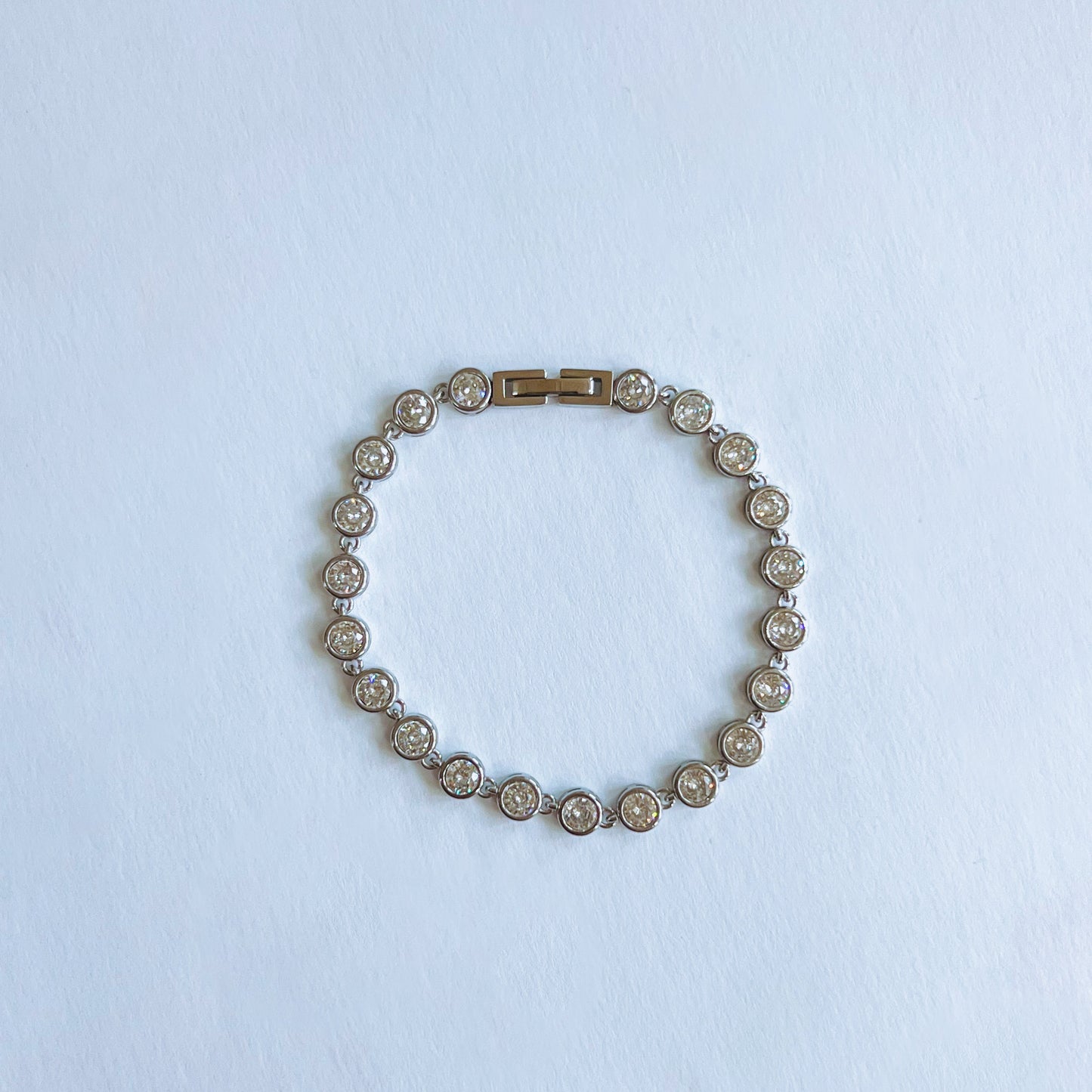 Bracelet with floral design on a light blue background