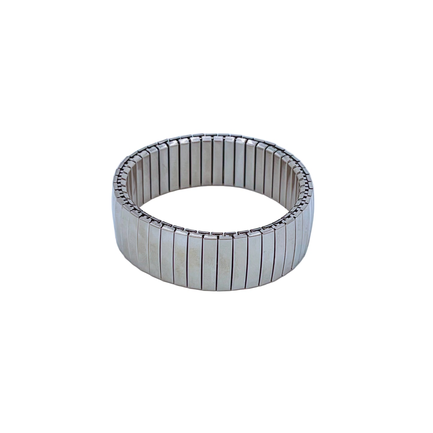 Silver Elastic Bracelet with a striped interlocked stainless steel design on a light background