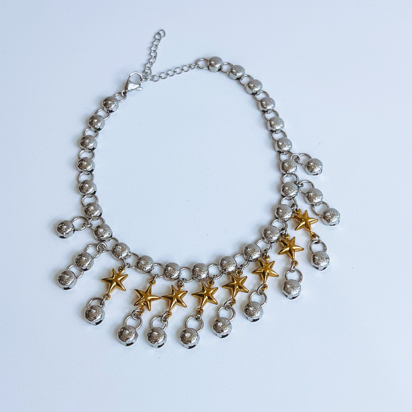 Star Choker Necklace with star-shaped pendants on a white background