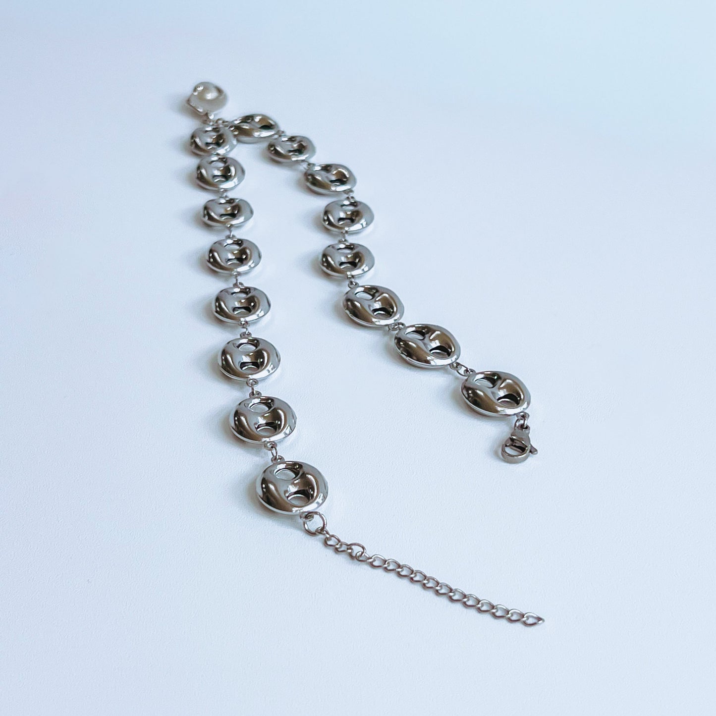 Theta Chunky Necklace - Silver chunky Silver necklace back clasp open on a light background