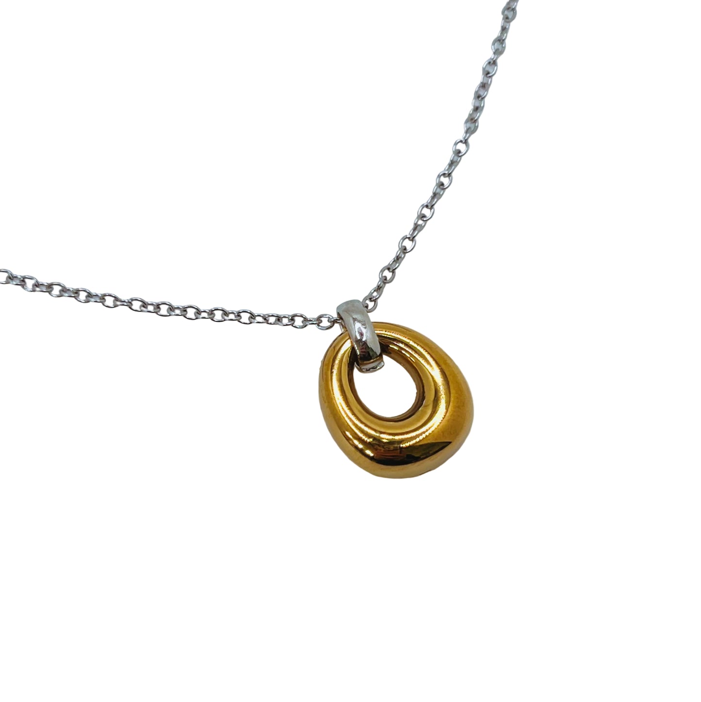 Two Tone Loop Necklace stainless steel Gold pendant on a silver chain against a white background
