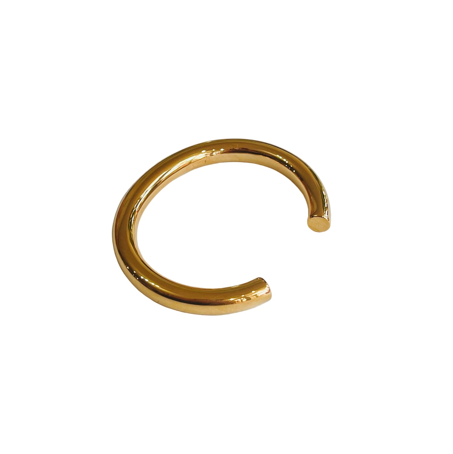 everyday Gold cuff bracelet on a light background