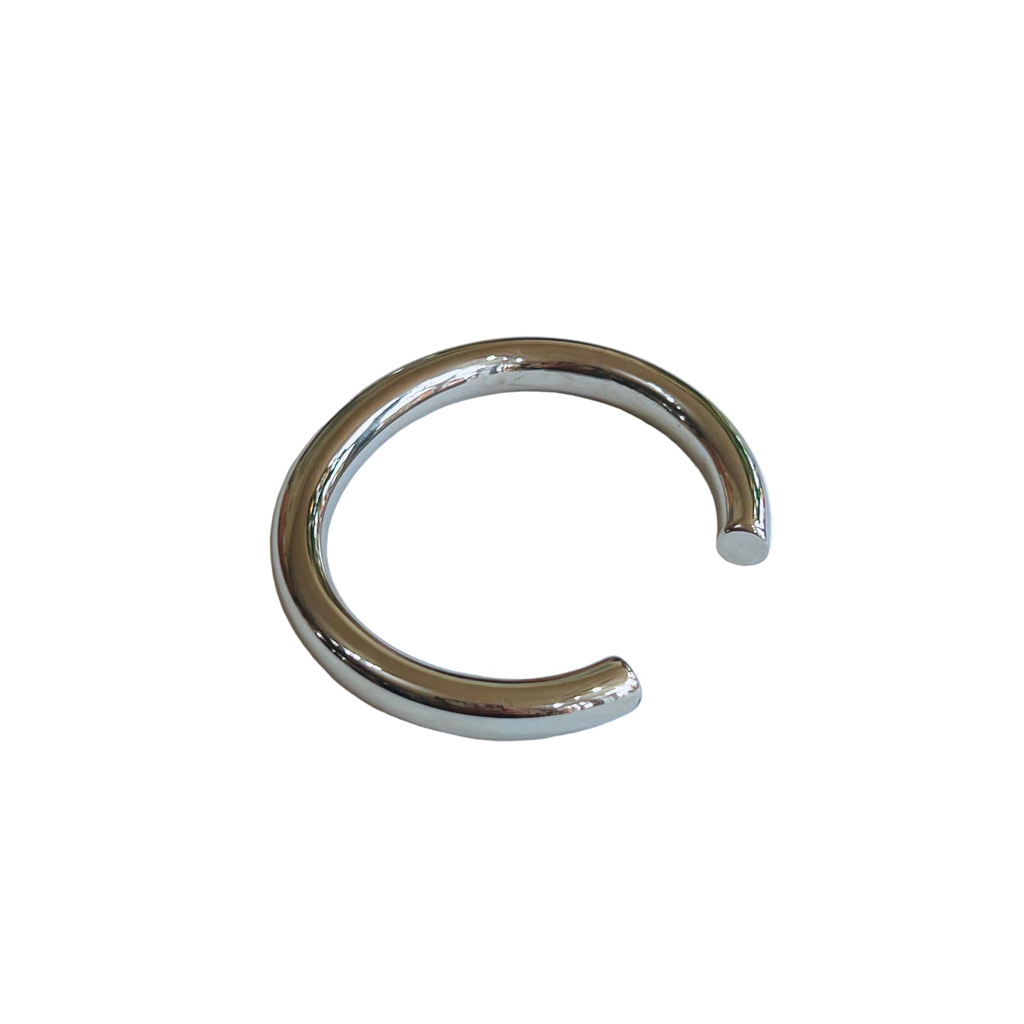 everyday silver cuff bracelet on a light background