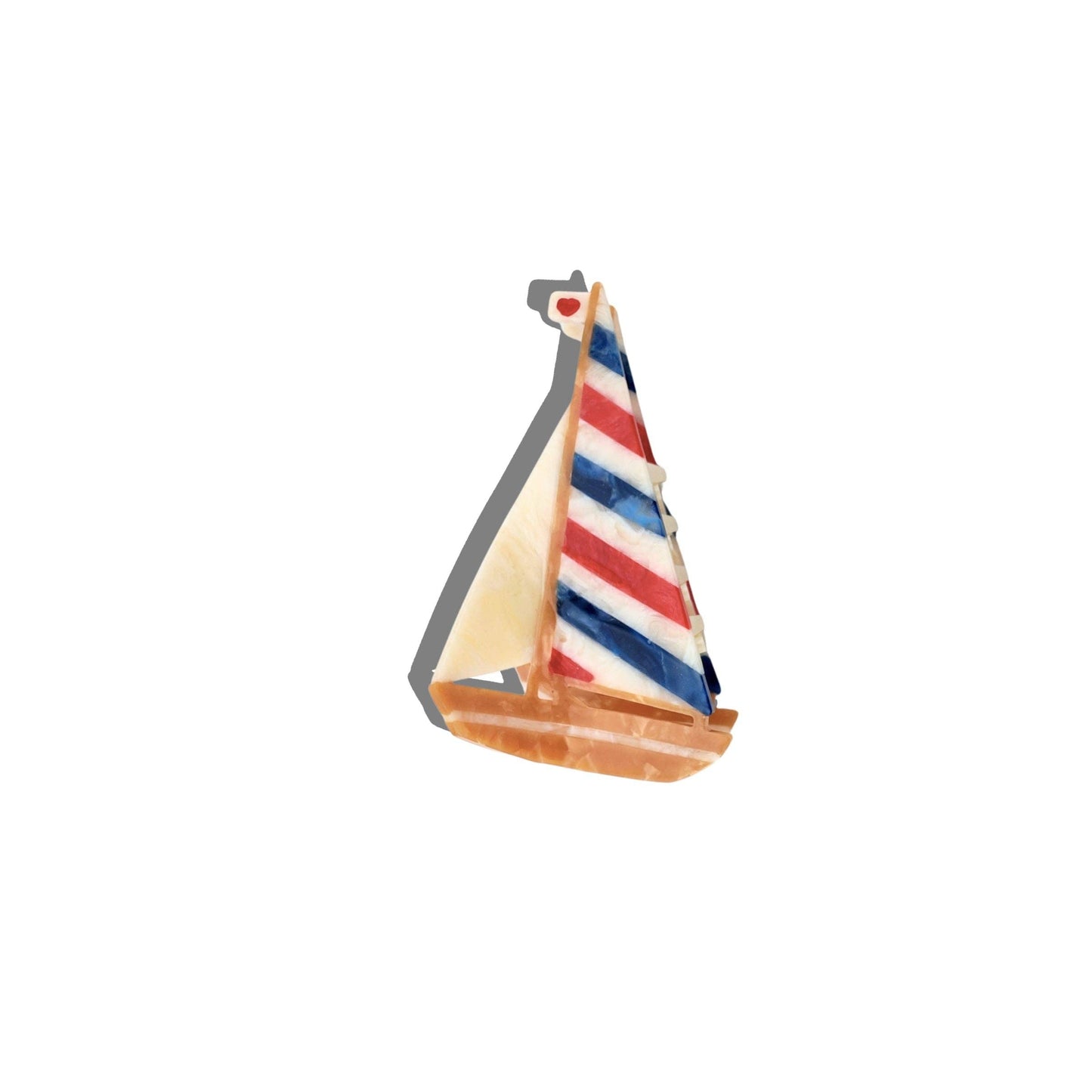 Model hand painted sailboat claw hair clip with a striped sail on a white background